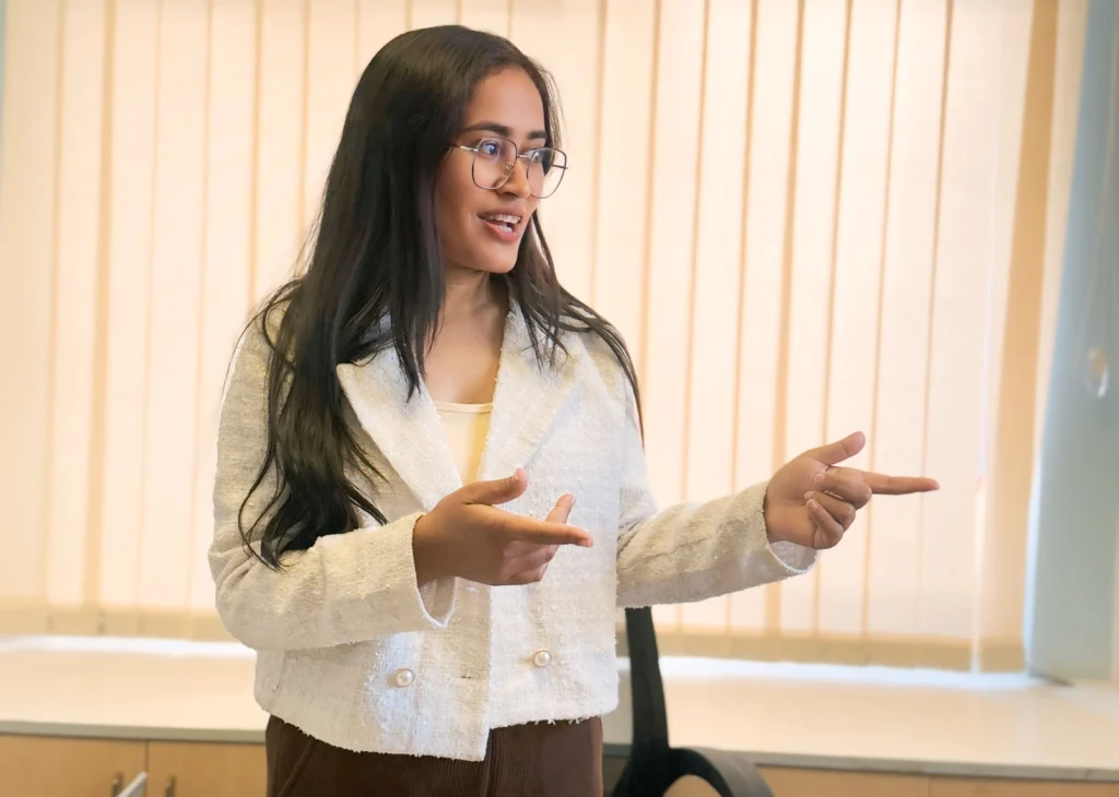 Sudeshna Thapa explaining a point in a meeting